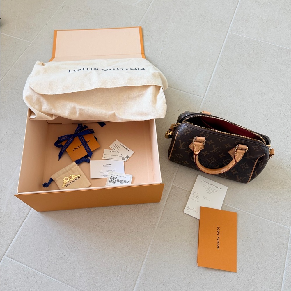 Louis Vuitton Receipt with Orange Envelope